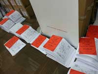 Document volumes with printed section dividers